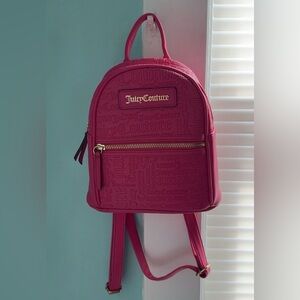 A New never worn juicy couture hot pink mini backpack with matching card case